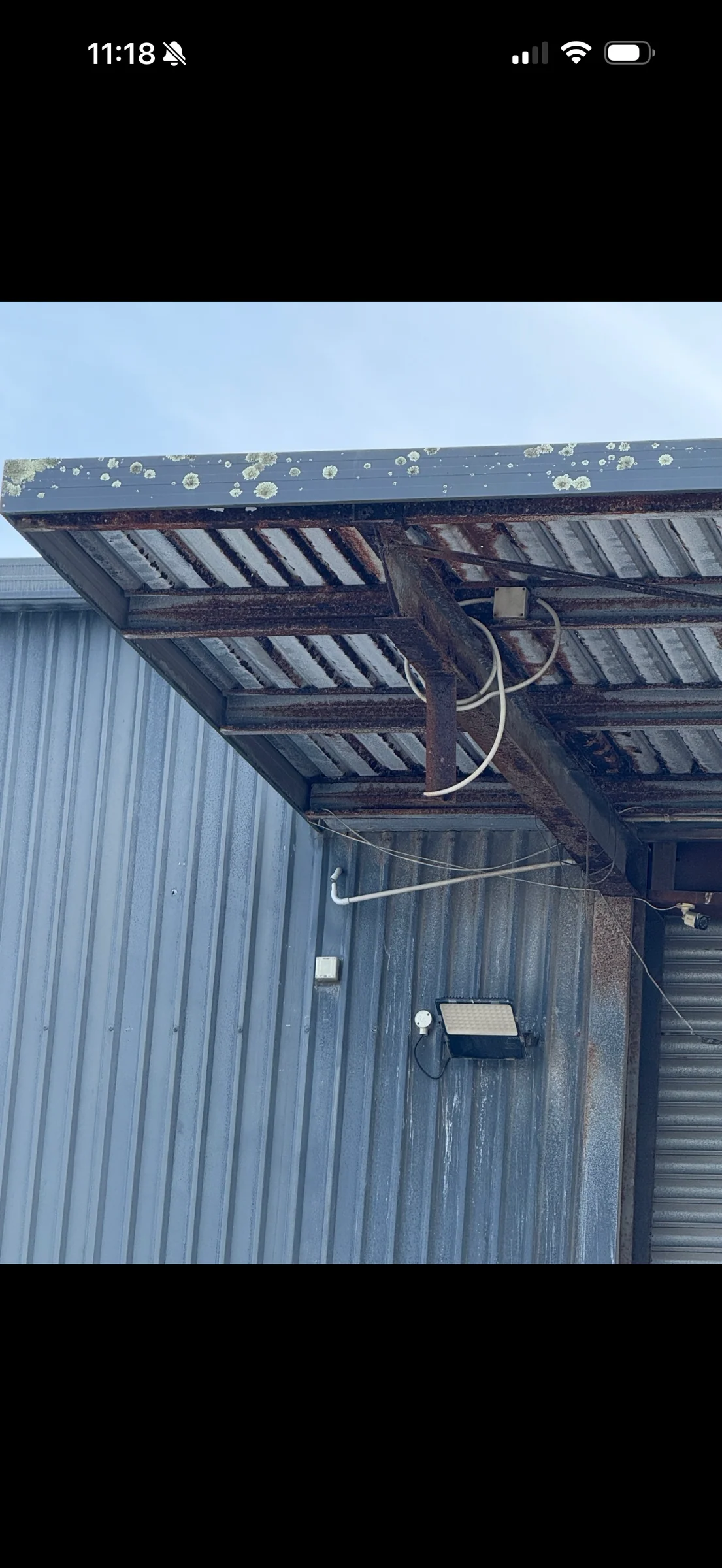 Before: original canopy and rusted structural steel at Alfred Street