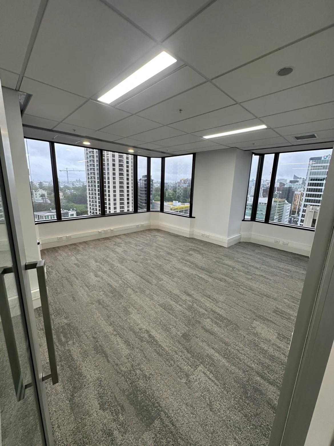 Finished office corner room with windows