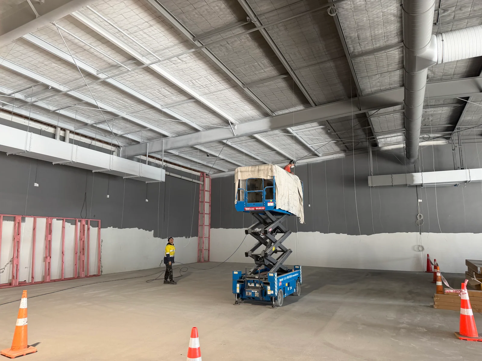 Ceiling painting work in progress at Anytime Fitness Constellation
