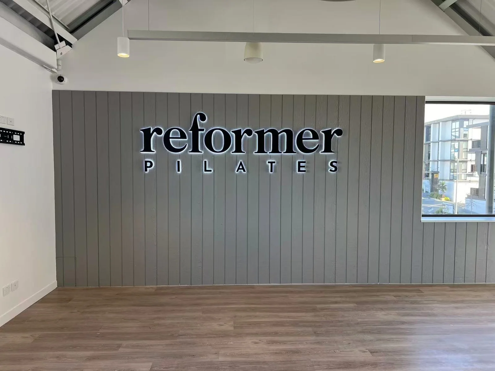Reformer Pilates sign and painted feature panelling